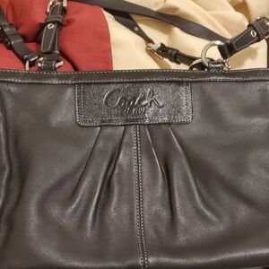 Black shoulder Coach bag with pink interior like new